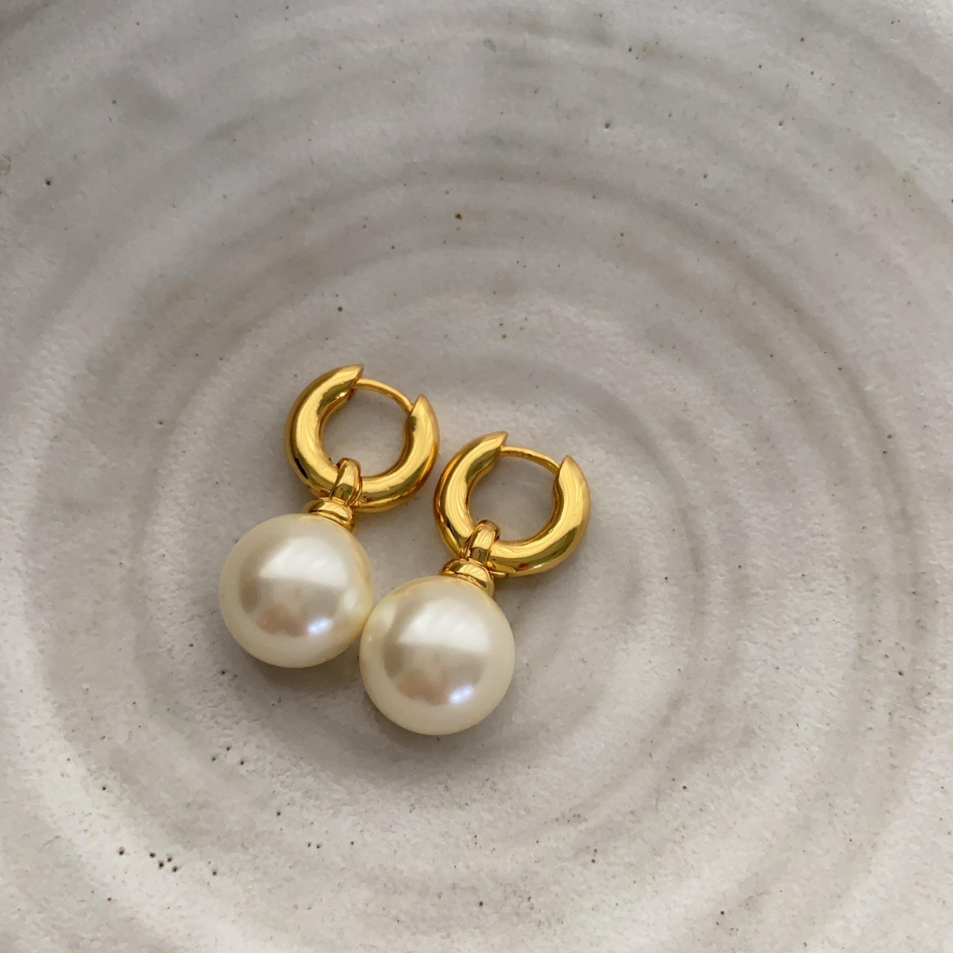 

Богемный темперамент геометрические серьги с жемчугом, элегантные и роскошные легкие роскошные ретро универсальные серьги