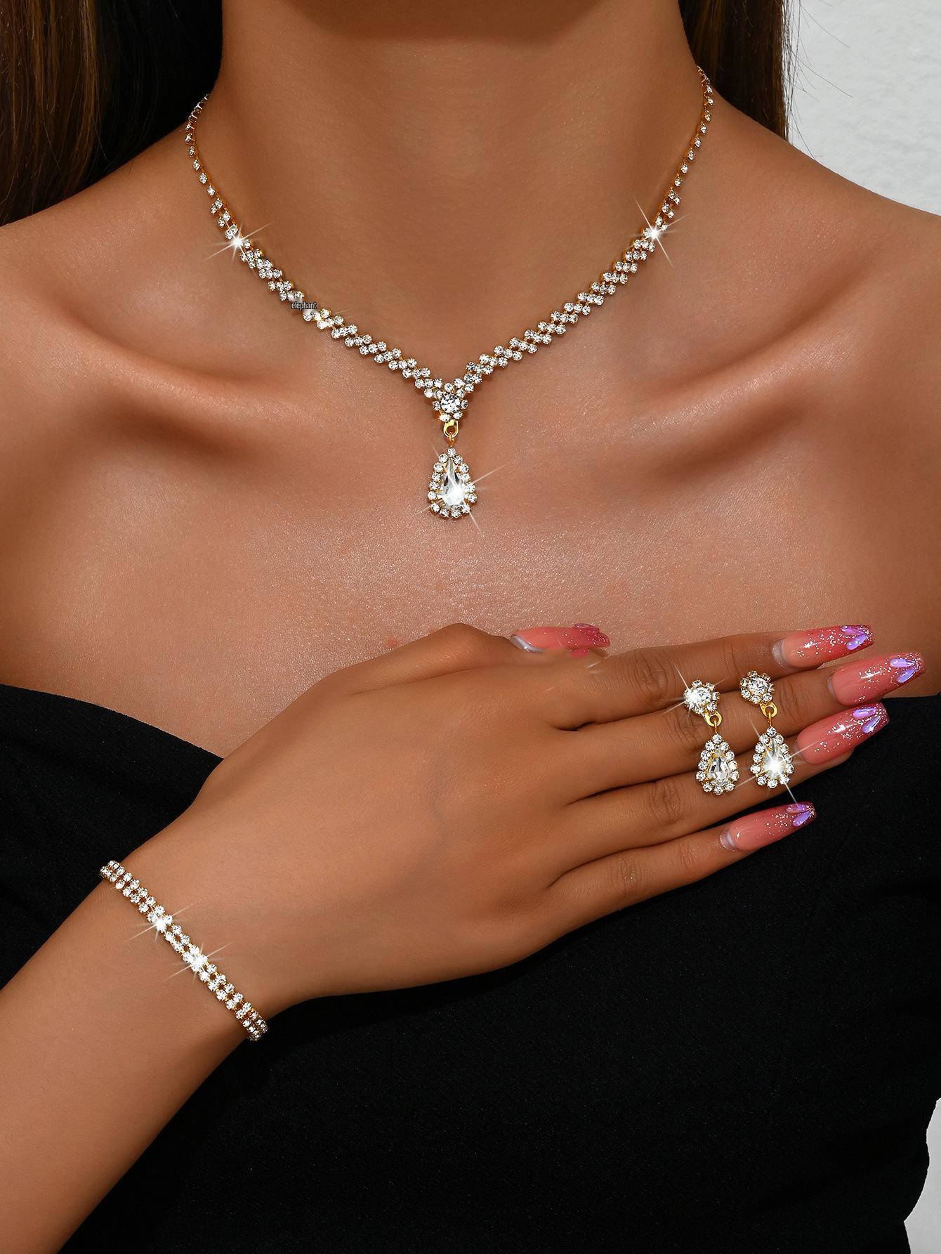 

Elegant Teardrop Bridal Jewelry Set: Necklace, Bracelet, Earrings золотой