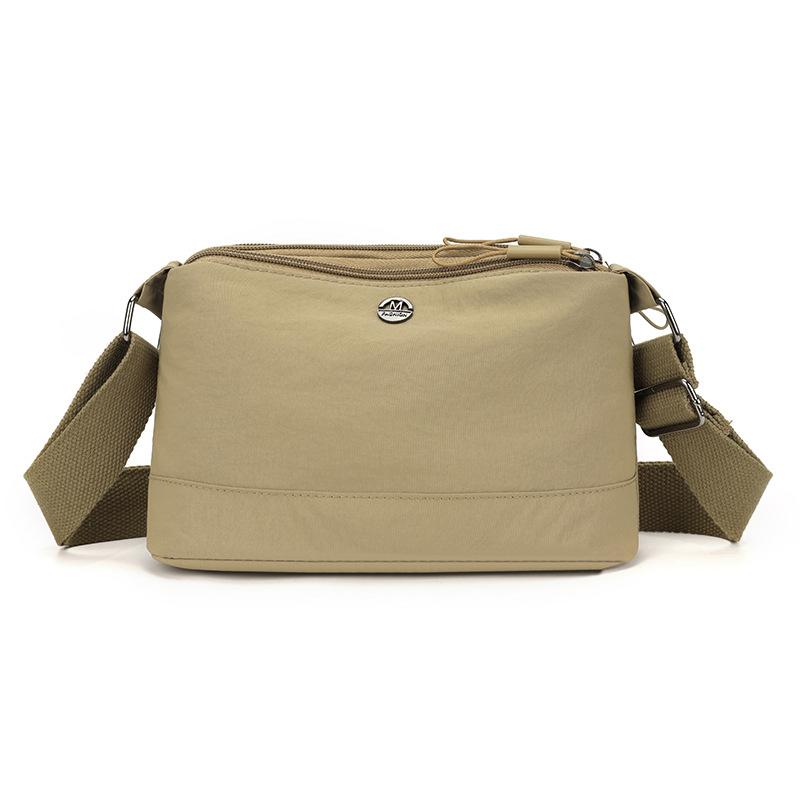 

Простая и Повседневная Нейлоновая Сумка-Мессенджер Женская Новая Легкая Сумка через Плечо Многослойное Хранение Корейский Иностранный Стиль Маленькая Сумка.