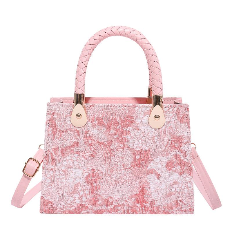 

Textured light luxury portable small square bag women s bag autumn new woven flower versatile shoulder bag commuter messenger bag рожевий