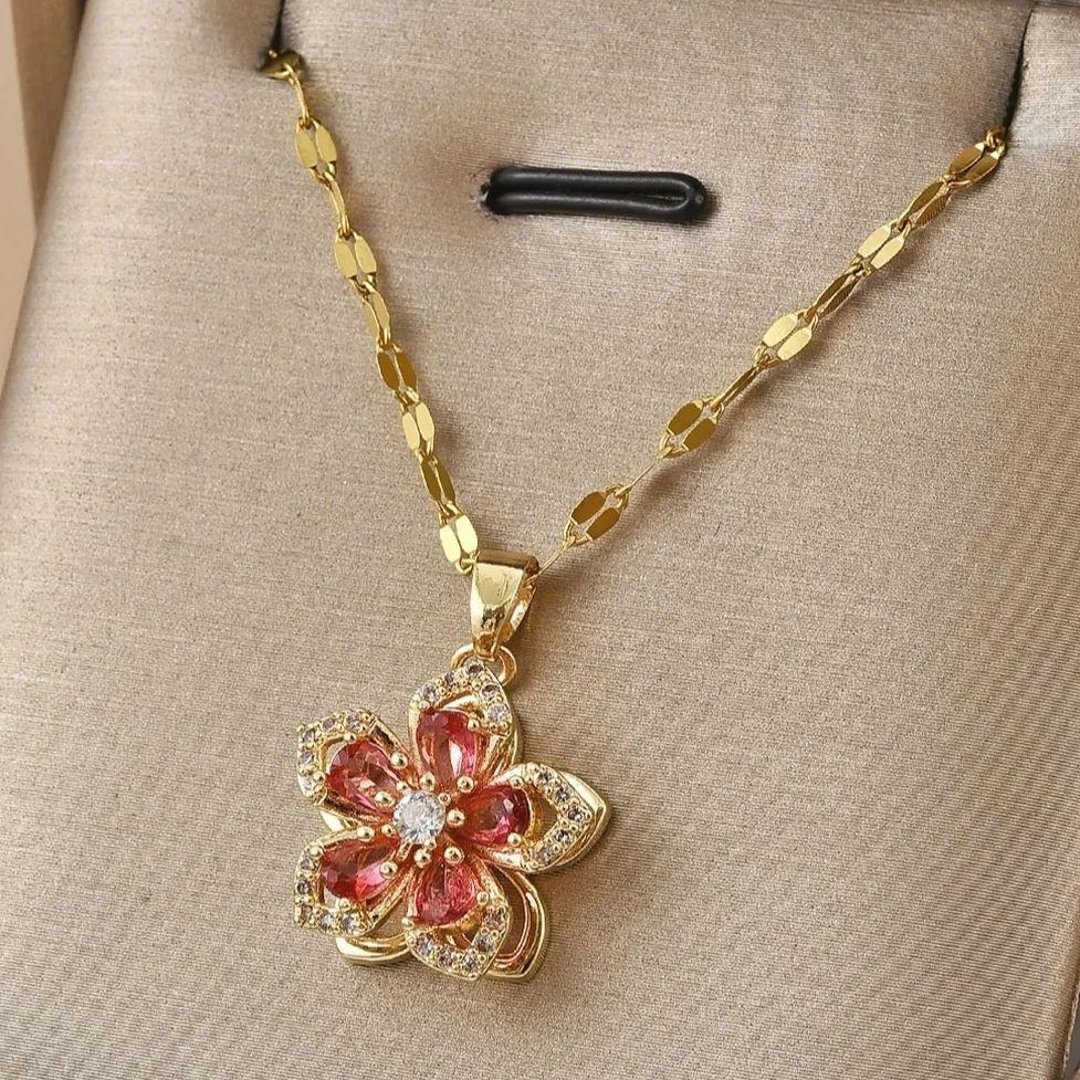 Exquisite glänzende Zirkonia-Blumen-Anhänger-Halskette für Damen Luxuriöse drehbare Blumen Edelstahl-Kettenhalskette Party-Schmuck