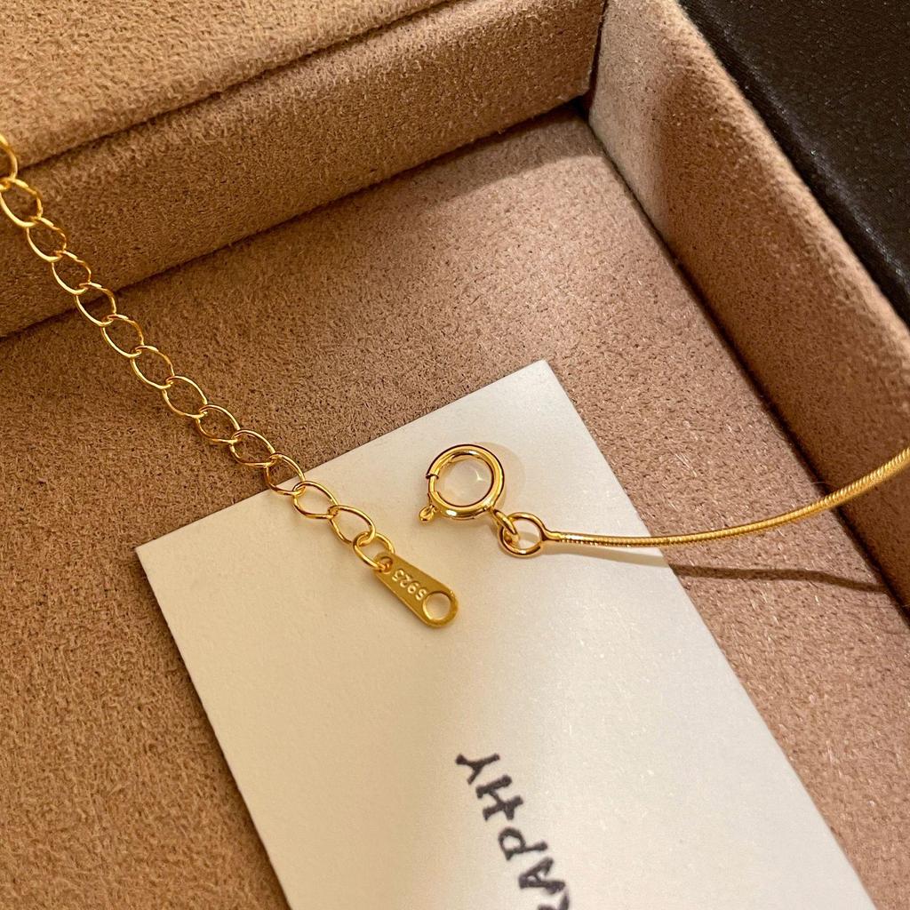 Přívěsek se zirkony ze 18K zlata a sterlingového stříbra na minimalistickém řetízku hadí kosti - Dámský elegantní bublinkový klíční kostní náhrdelník