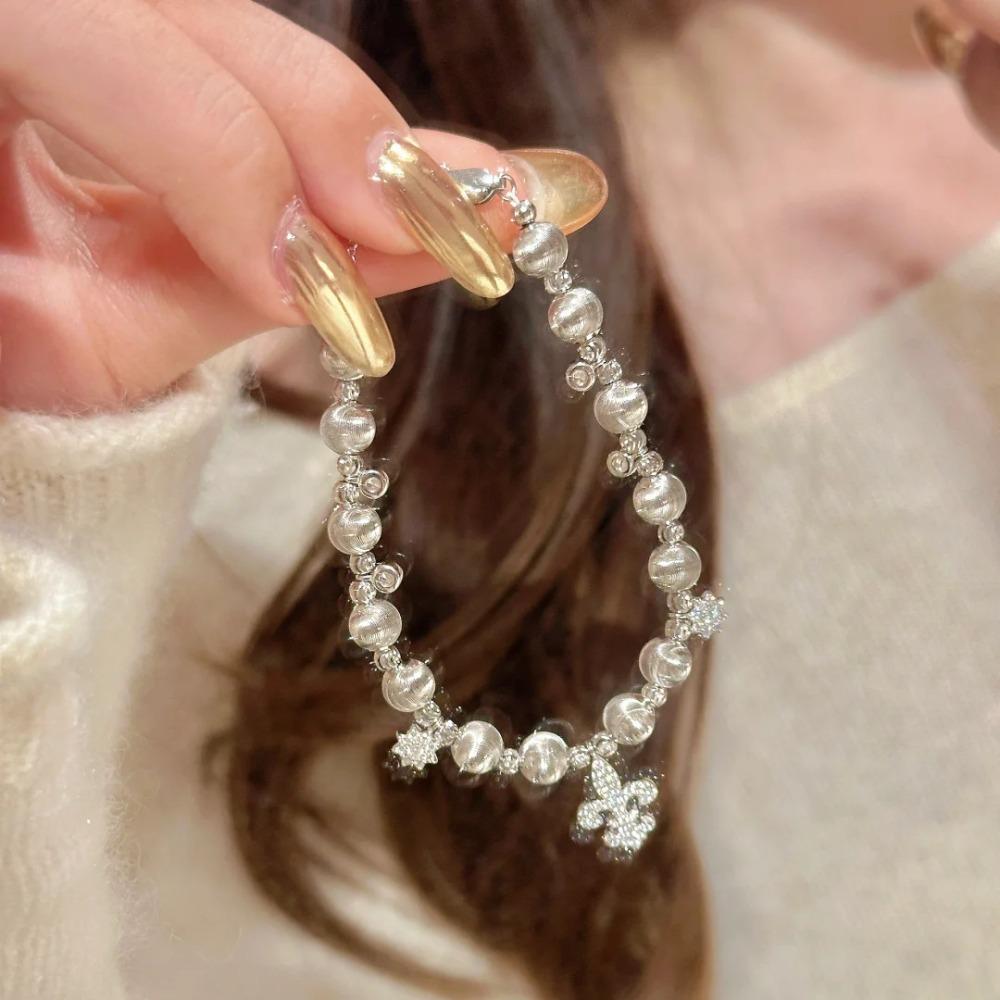 

Elegant Winter Iris Snowflake Cat Eye Bracelet New Chinese Style Luxury Diamond Inlaid Iris Flower Bracelet for Women