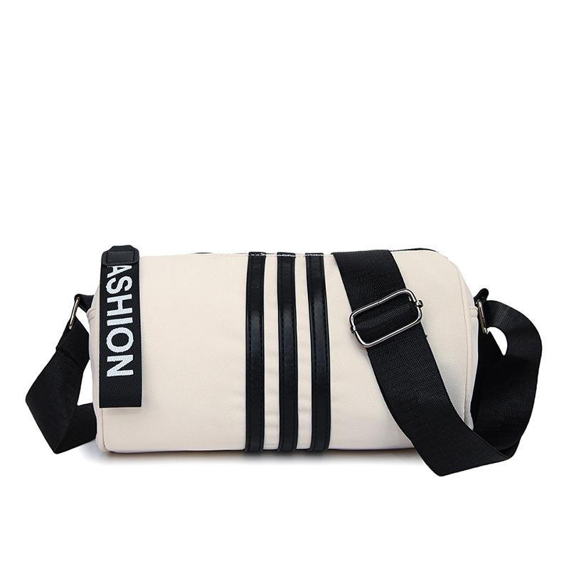 Large Capacity Canvas Bag Girls 2025 New Fashion Versatile Single Room Messenger Bag High Sense Casual Cylinder Bag