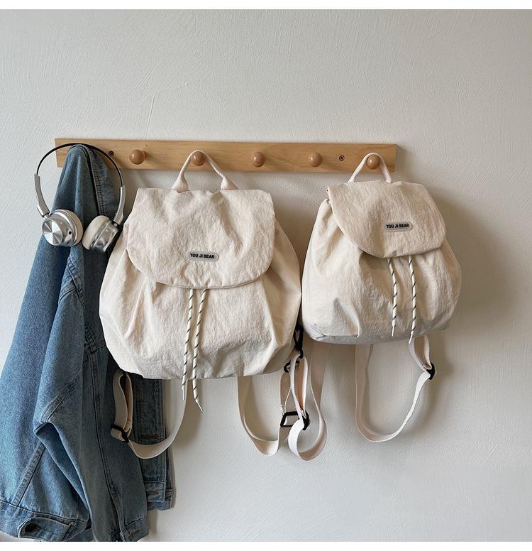 Contrasting color cloth backpack, women's 2025 summer new student commuting lazy style fashion versatile handbag