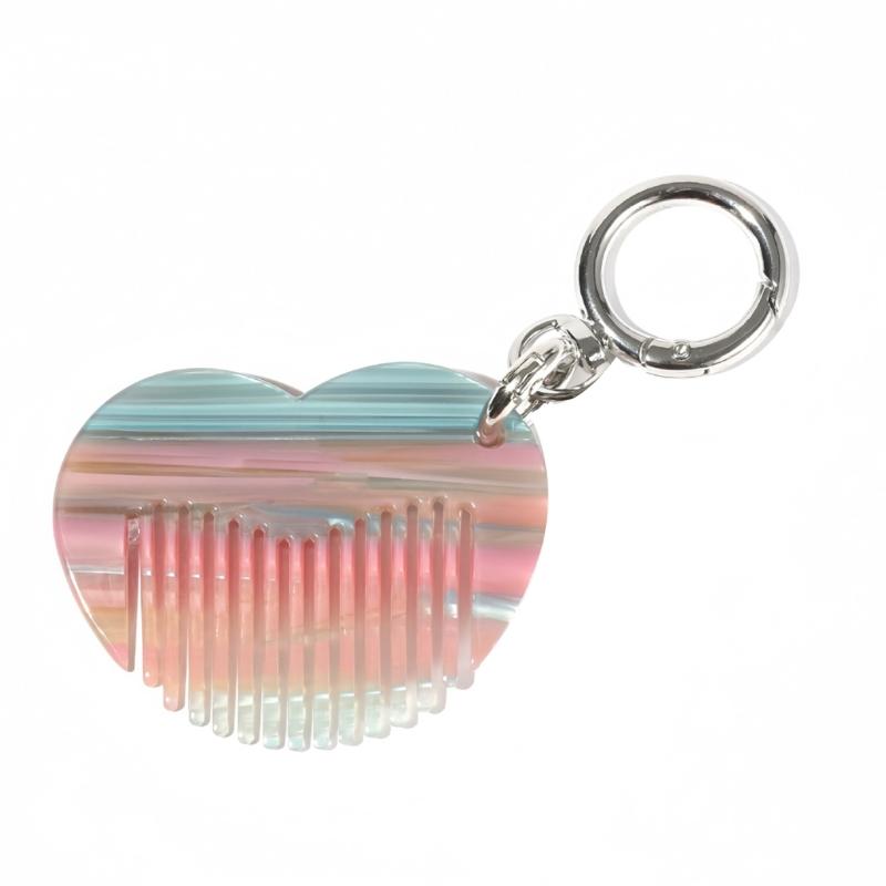 

Versatile Double Purpose Heart Keychain And Miniature Comb With Rounded Brims For Safe Handling Everyday Carry
