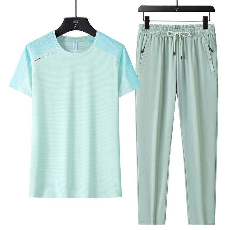 

Women s Plus Size Ice Silk Short Sleeve Two-Piece Sports Set with Elastic Long Pants XXXL