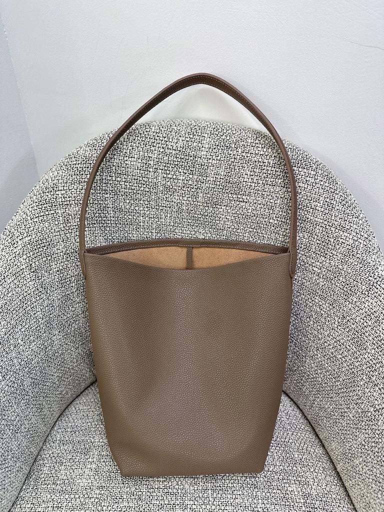 Nova bolsa de balde Row de grande capacidade em couro para mulher estilo minimalista TR com padrão de lichia bolsa tote portátil de ombro para o dia a dia
