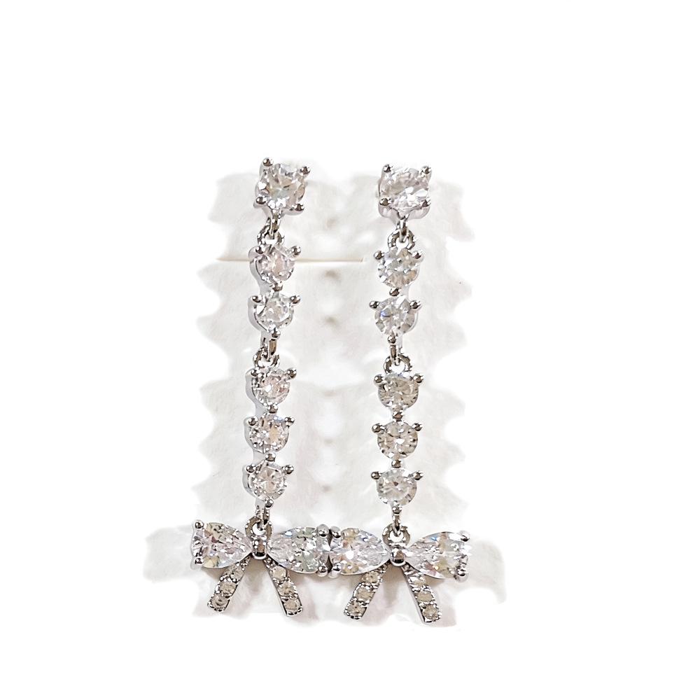

Cross Bow Zircon Tassel Earrings - Women s Korean Niche Design, High-End Long Jewelry