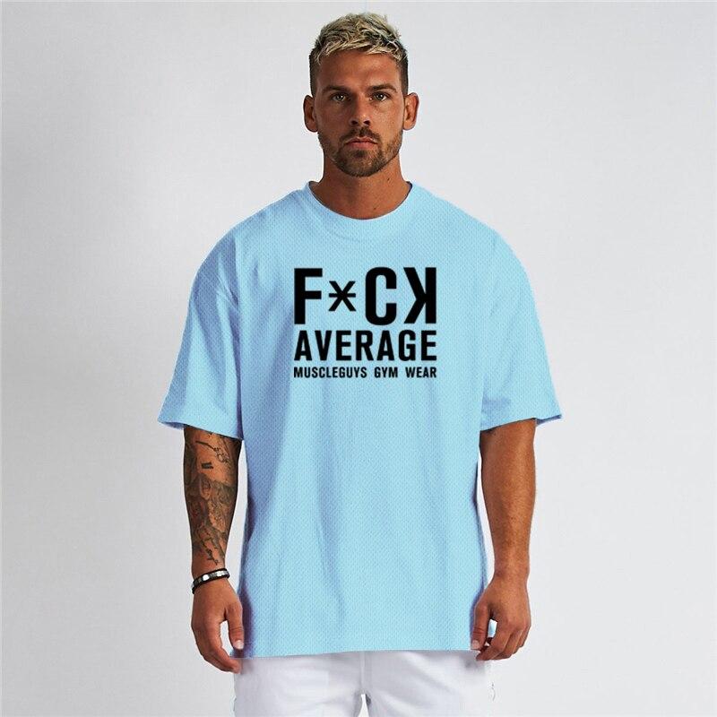 Muscleguys Oversize fitness pánské tričko s krátkým rukávem, jednoduché prodyšné, volné polyesterové tričko