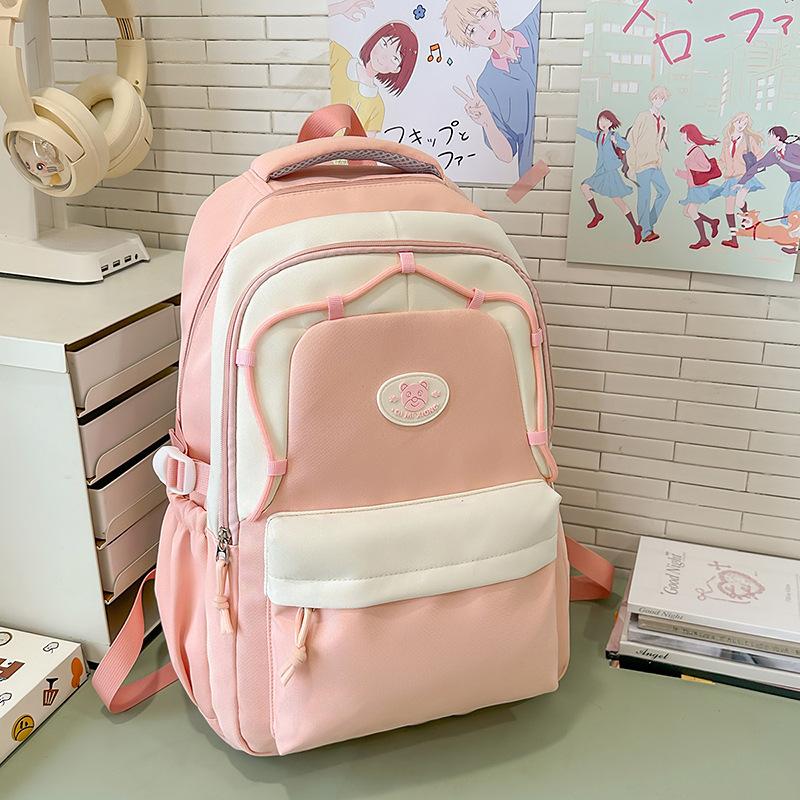 New Decompression Large Capacity Schoolbag Junior High School Girls and Senior High School Students Light Campus Backpack.