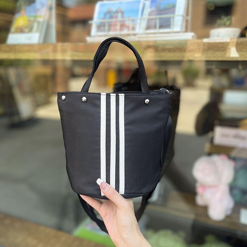 Casual simple lightweight bag women's summer new fashion nylon bucket bag commuter shoulder bag