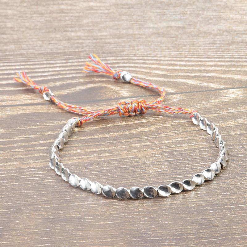 Handmade Woven Bracelet with Irregular Copper Beads and Creative Tassel Drawstring