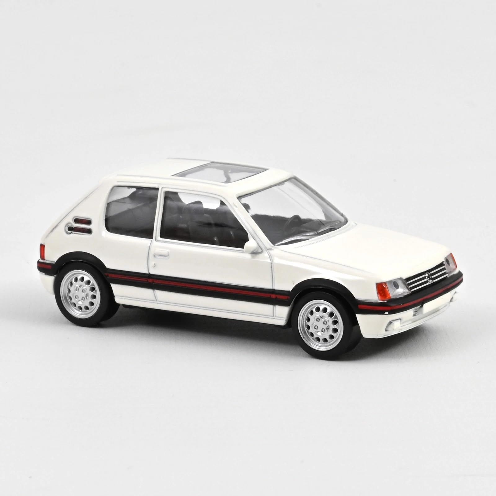 

Norev масштаб Peugeot 205 GTi 1986 Белый NOREV JET CAR 1/43 белый