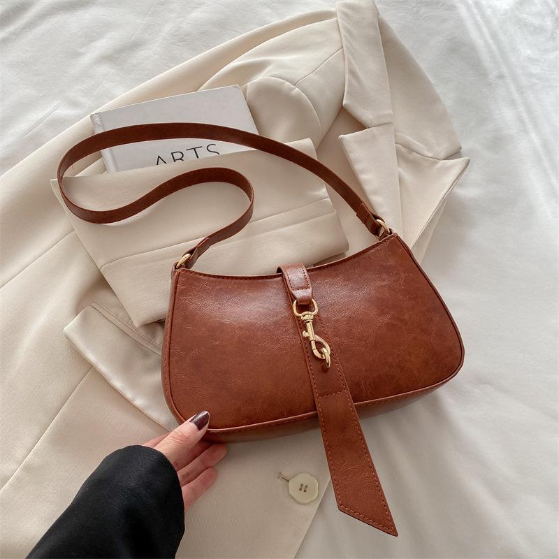 

Повседневная литературная личность модная женская сумка 2025 новая высококлассная модная сумочка в зарубежном стиле на плечо под мышку коричневый
