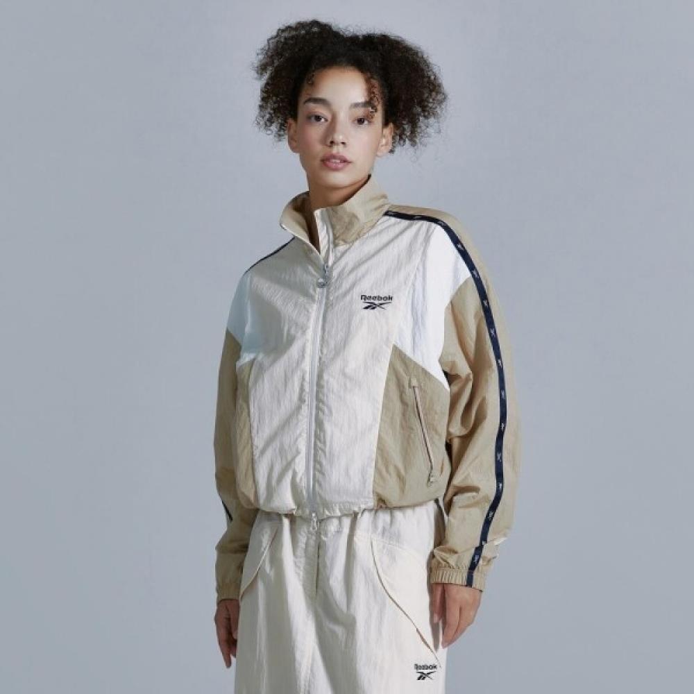 

Reebok Ветровка Rival Crop бежевого цвета Reju4fj13i1 beige/XS