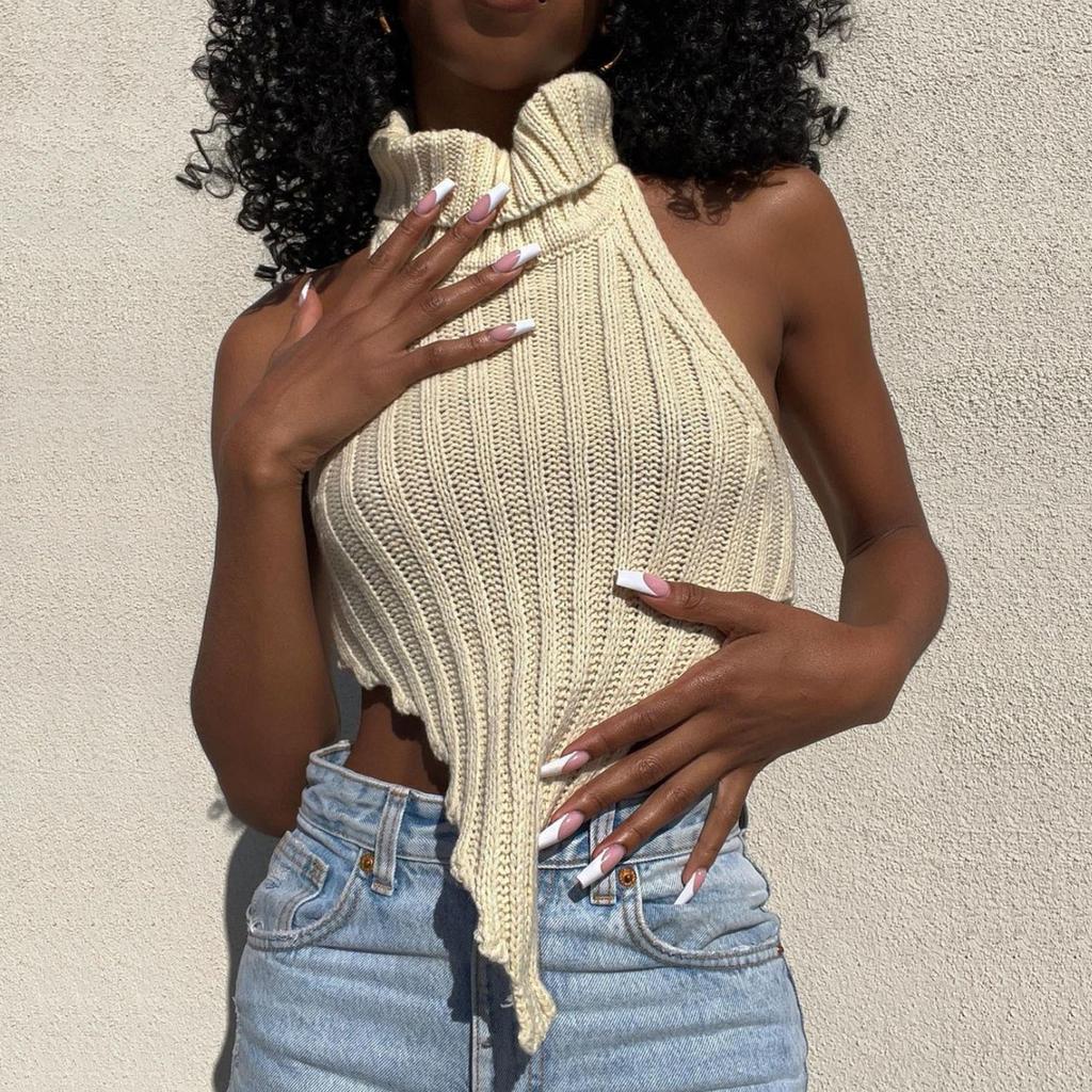 Dámský vlněný pletený top bez rukávů s vysokým výstřihem, nepravidelným střihem a sexy odhalenými zády