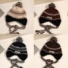 Cozy Chic Knitted Winter Hat For Women Featuring Colorful Pom Poms And Warmth