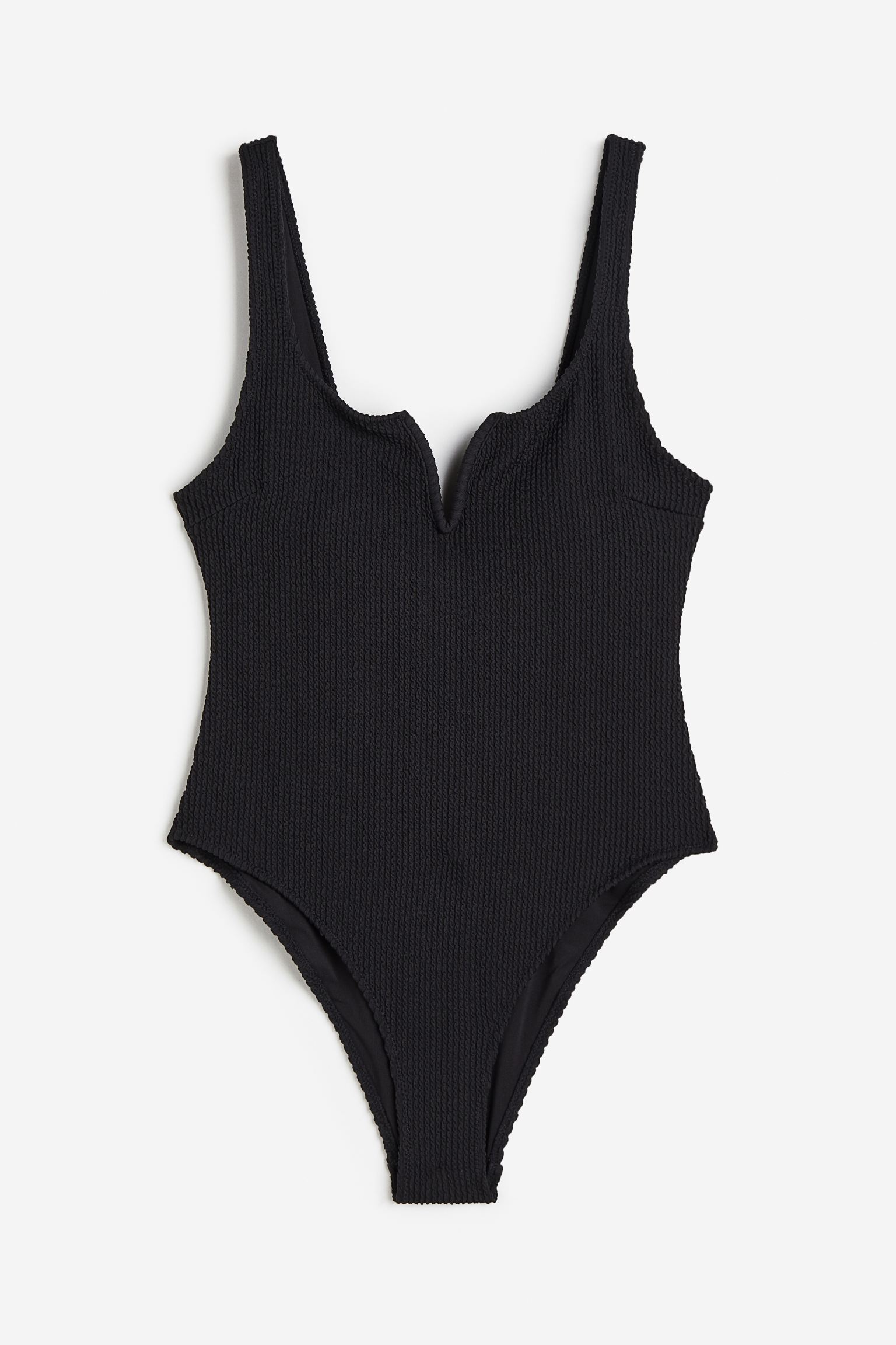 

Купальник с высоким вырезом