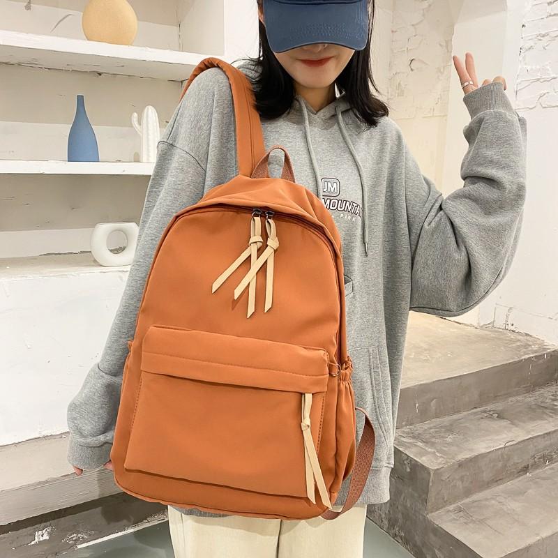Schoolbag schoolbag female college student Japanese ins solid color Harajuku student backpack wholesale large capacity versatile backpack