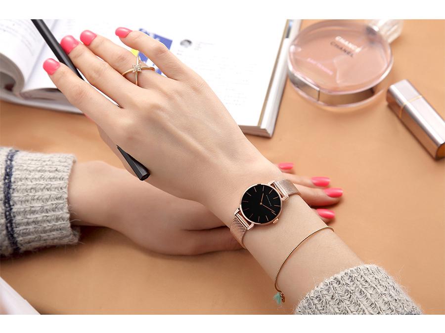 Elegant Slim Waterproof Wristwatch with Steel Mesh Band - Minimalist Japanese Design for Women.