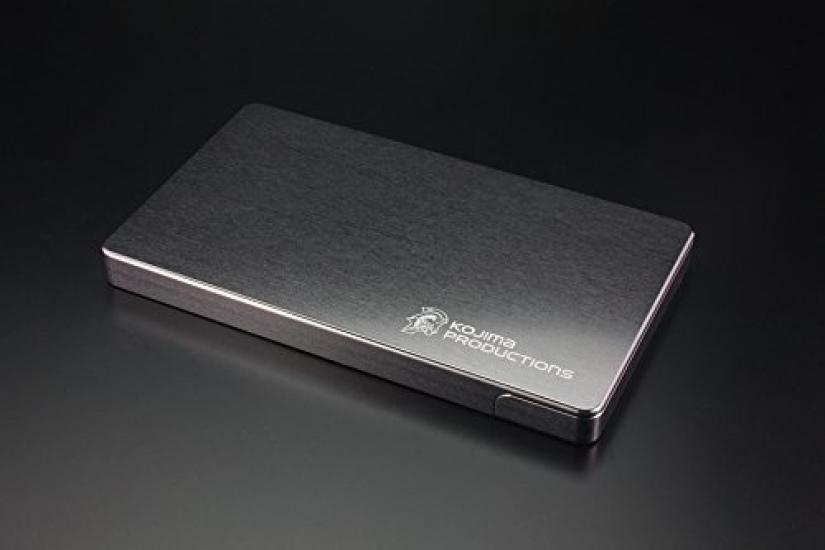 

GILD design business card carved out Kojima Productions logo version holder,