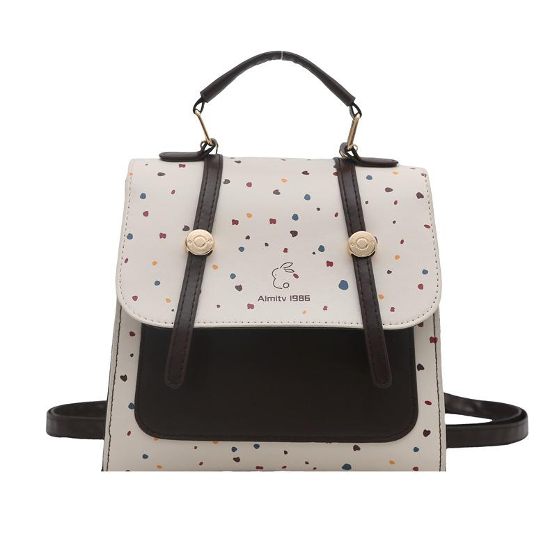 

2025 нова мода одноплечовий ретро простий нішевий коледж стиль горошок повсякденний універсальний текстурний жіночий рюкзак білий