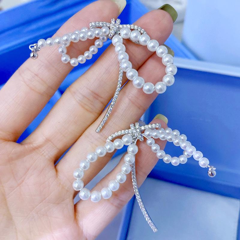 

Hejia Exaggerated Ribbon Pearl Line Sterling Silver Earrings for Women - Korean Style Luxury Copper