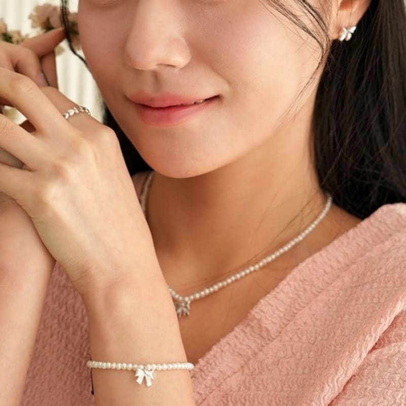 BELLOOGGI Heart Ribbon Pearl Bracelet