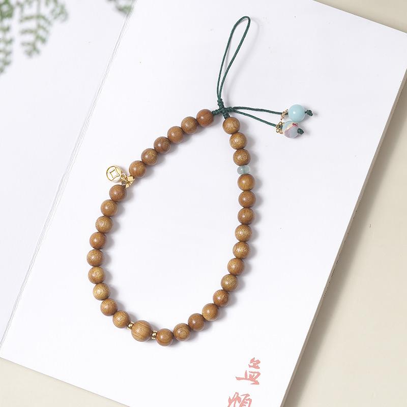 Armband aus goldenem Sandelholzperlen mit Quaste: Unisex Multi-Wrap Rosenkranz im alten chinesischen Stil.