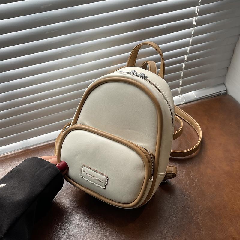 Fashion niche bag women's new contrasting color small backpack portable retro lightweight college style backpack