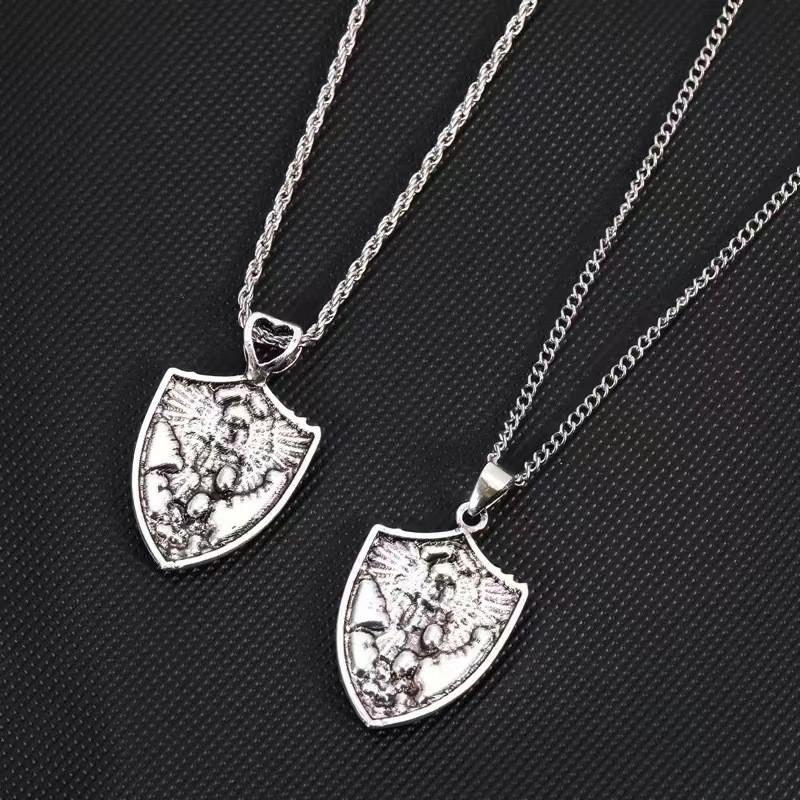 Elegant Shield Pendant Necklace In Silver With Cartoon Character Wing Design For Unisex Fashion Accessory
