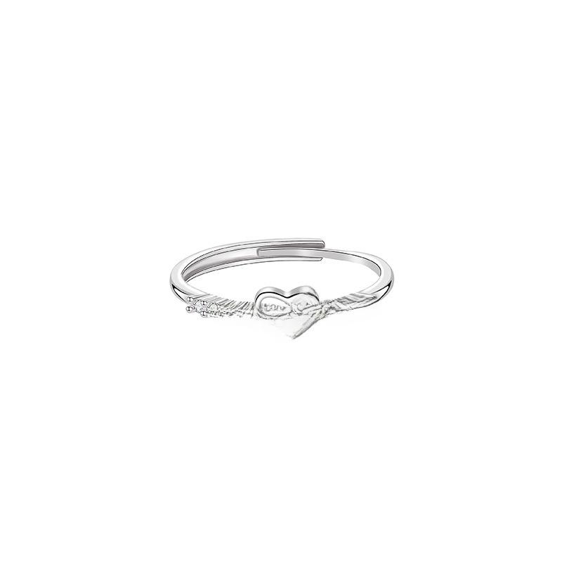 Damen Verstellbarer Liebes Zirkon Ring: Schlichtes hohles Herzdesign mit Diamantakzenten, ideal für den Zeigefinger einer modebewussten Freundin.