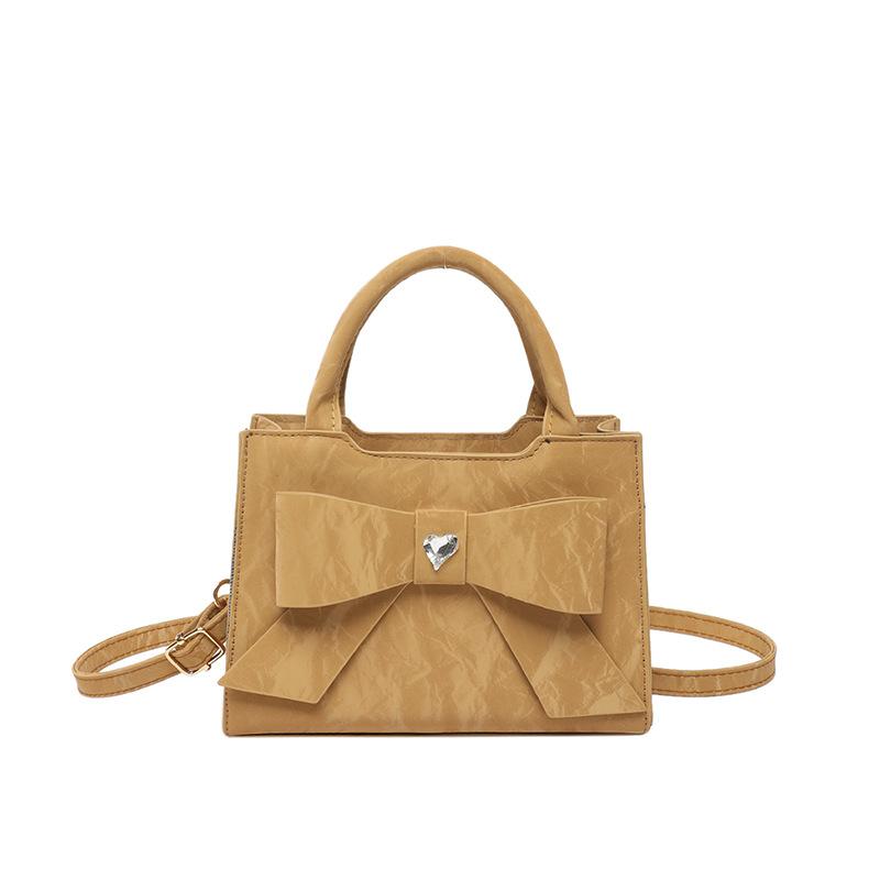 Highend fashion women's handbag bow simple shoulder messenger bag commuter versatile women's bag