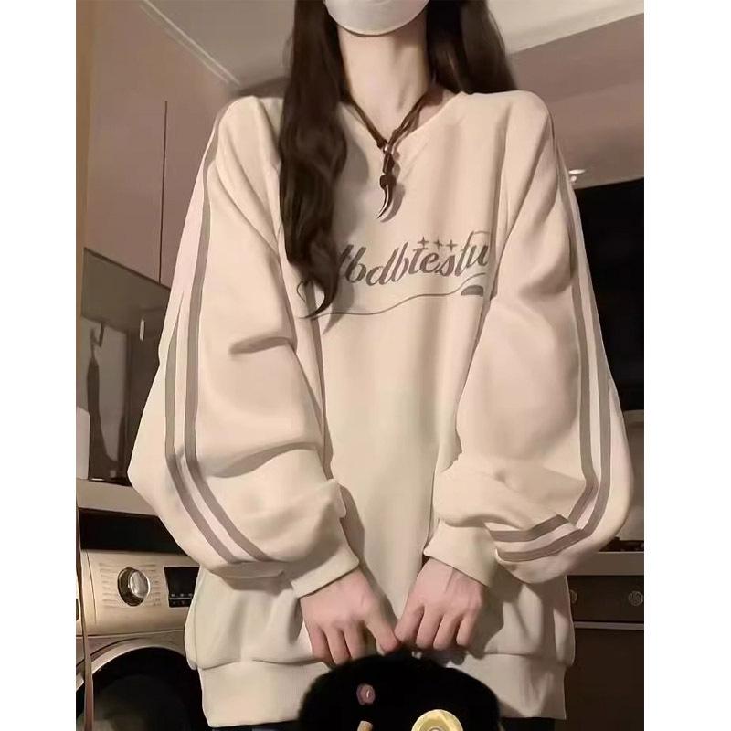 Bluza damska w paski z dekoltem w serek - Kolekcja Wiosna/Jesień 2024