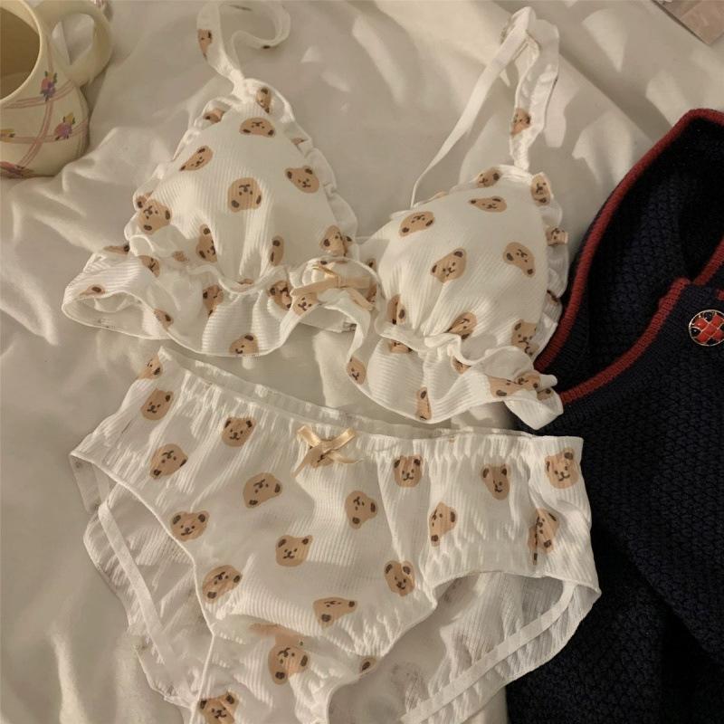 

Бюстгальтер на косточках с принтом и цветочным рисунком L