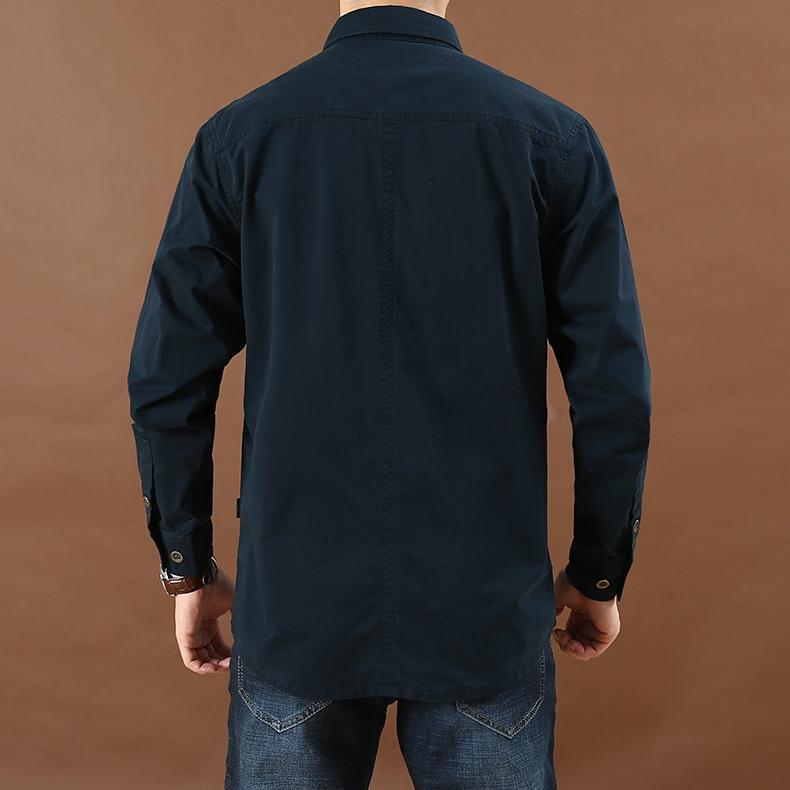 Camisa casual de manga larga para hombre de corte holgado con dos bolsillos en el pecho