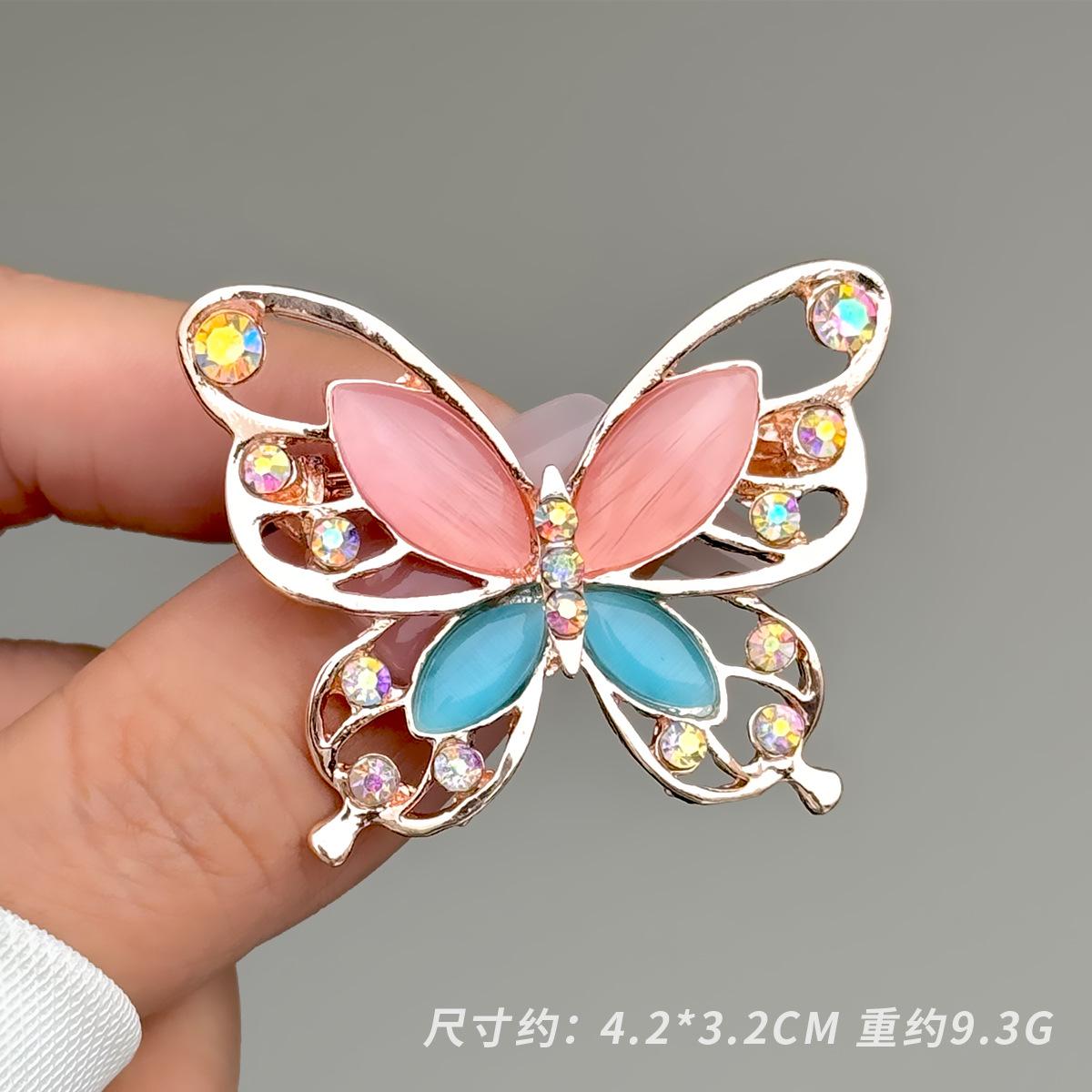 

Брошь из сплава Xiaoxiangfeng с инкрустированными бриллиантами и опалом, брошь в виде цветка-бабочки с усовершенствованной текстурой и полой грудью, аксессуары для одежды