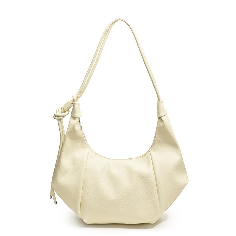 High-end bag women's large-capacity new trendy autumn and winter retro niche design messenger bag commuter dumpling bag