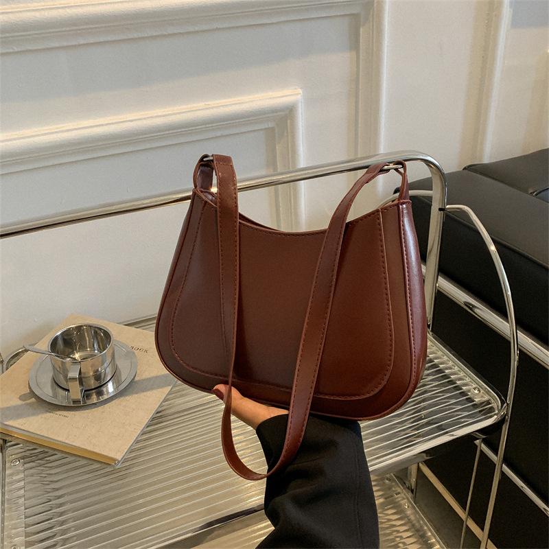 

Сумка жіноча ретро під пахвою великої ємності 2024 осінь проста модна сумочка на одне плече косий розмах пельменна сумка жіноча приплив темно-коричневого кольору