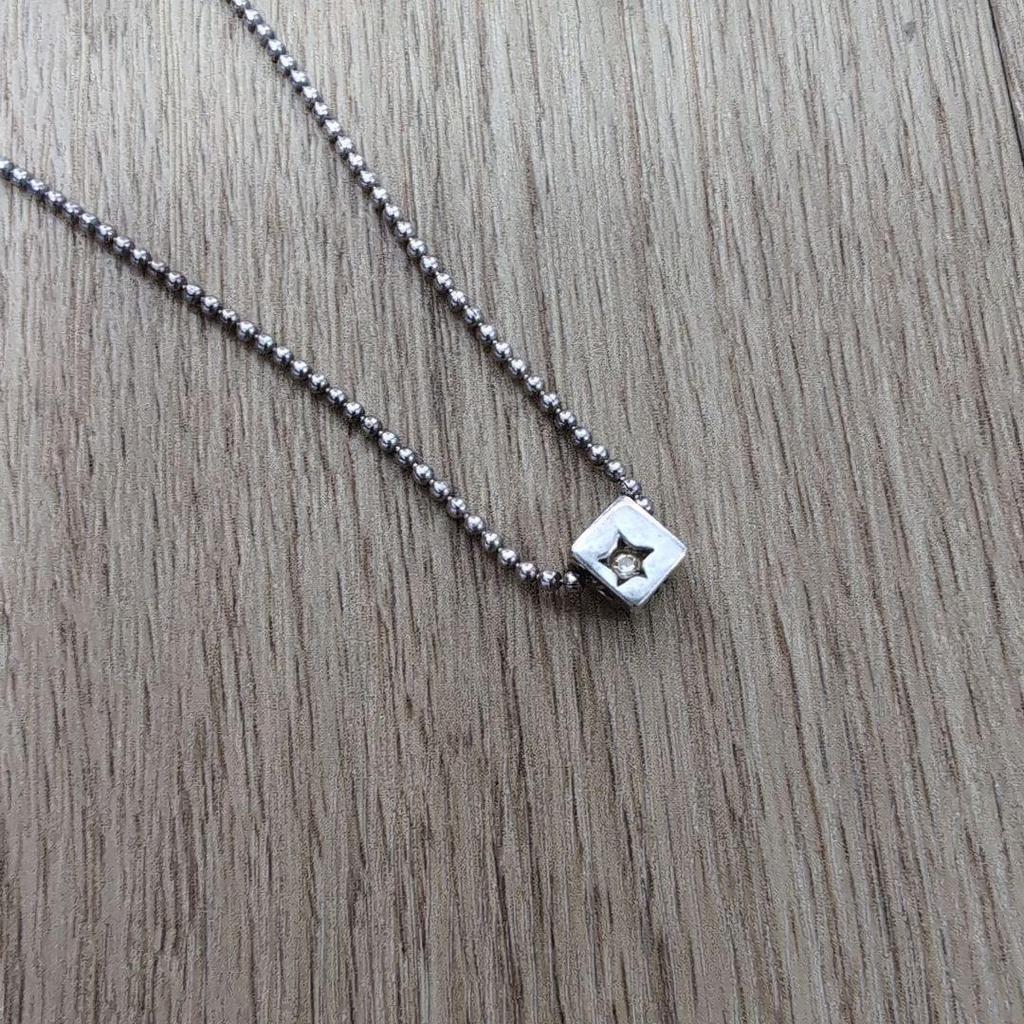 Used moschino silver necklace square dice