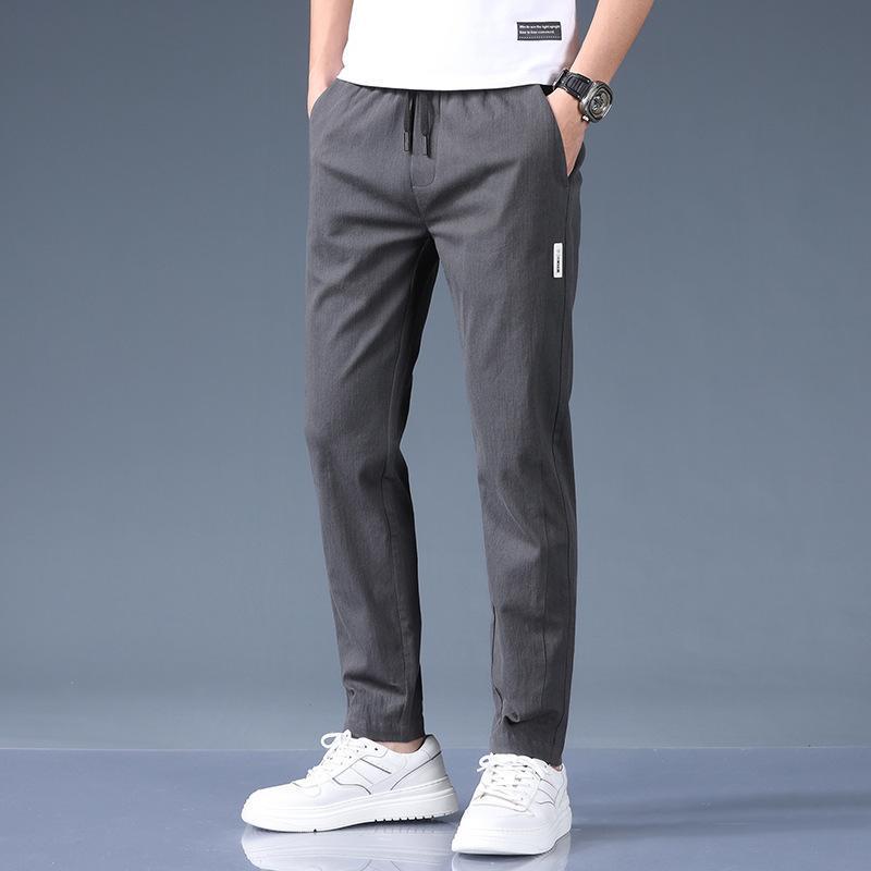 

Разноцветные мужские повседневные брюки с эластичной талией – Модные, удобные и универсальные для повседневной носки и деловых мероприятий 36 темно-серого