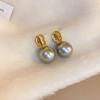 Grey pearl C-shaped earrings, fashionable temperament, high-end stud earrings, niche French elegant light luxury earrings, women
