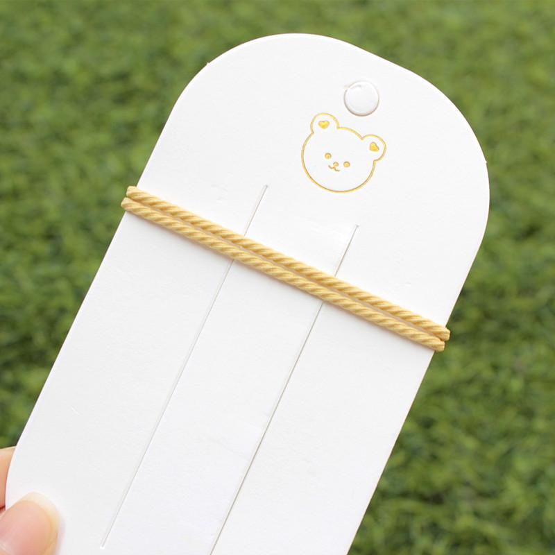 

Браслет-магнит с мультяшным другом: Сестринская резинка для волос и головной убор двойного назначения - Идеальный подарок на выпускной для студентов колледжа