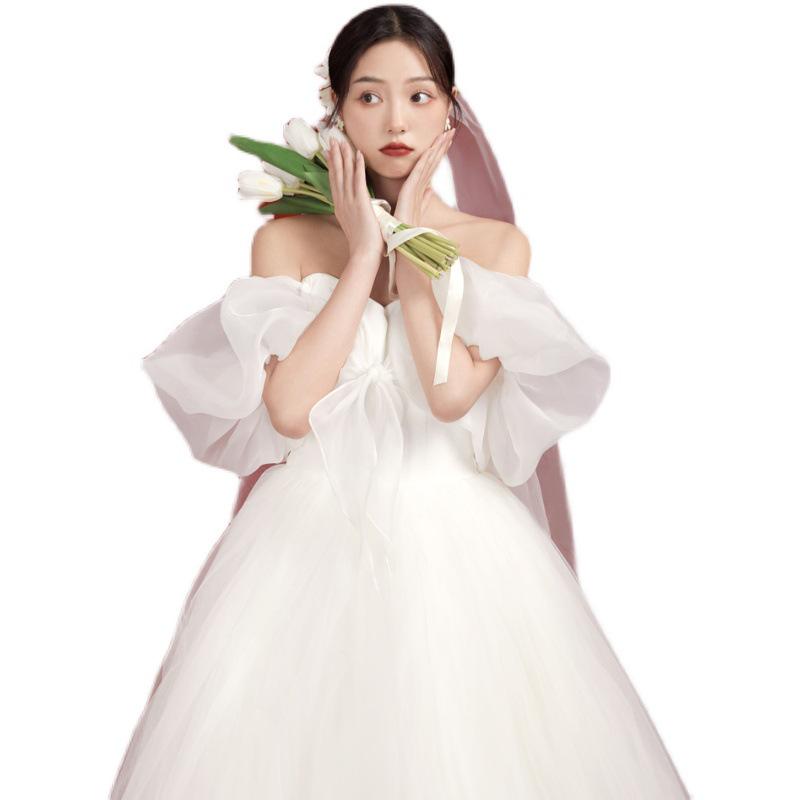 2026 One-Shoulder Wedding Dress with Bow: Slimming Puffy Skirt & Puff Sleeves, Floor-Length Princess Fairy Look for Travel Photos and Events.