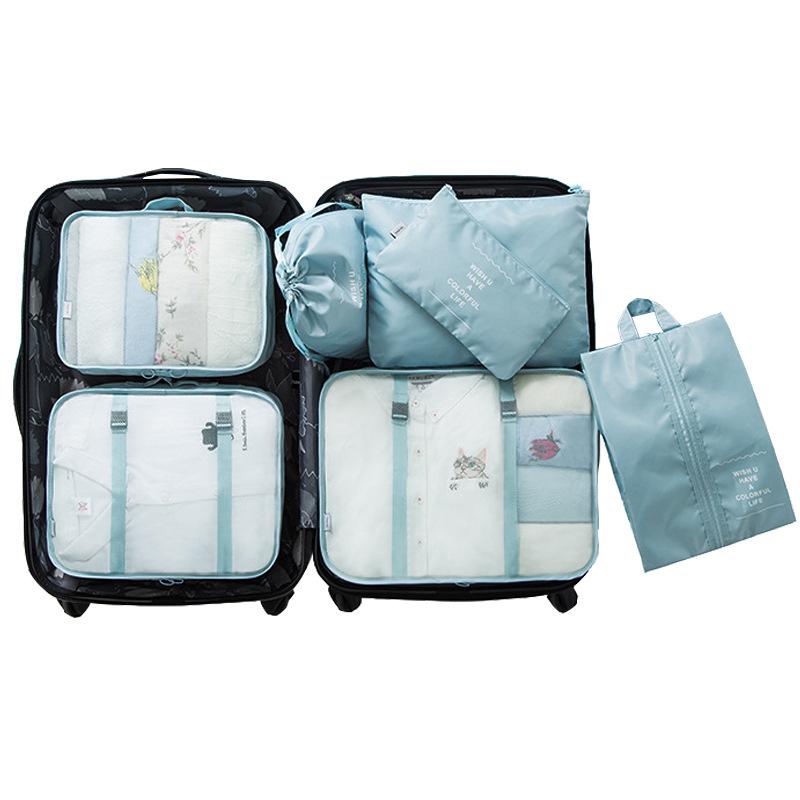 

Набор органайзеров для путешествий из восьми предметов: Сумки для хранения и косметичка для одежды и аксессуаров.