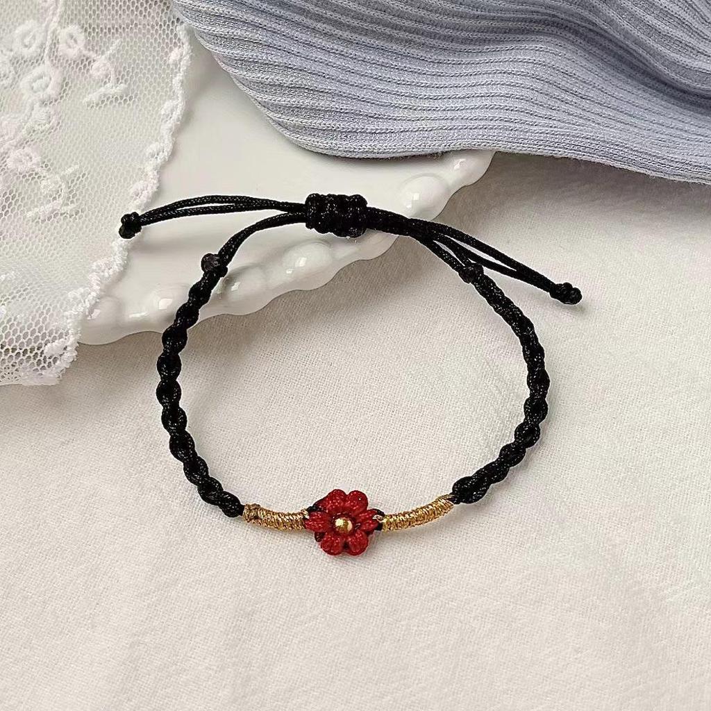Yi Yangqianxi's Red Flower Hand-Woven Ethnic Bracelet for Women