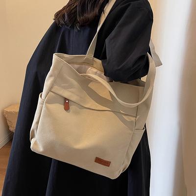 Canvas-Tasche Damen große Kapazität neue Mode Herbst und Winter vielseitige Umhängetasche Stofftasche Klasse Tragetasche