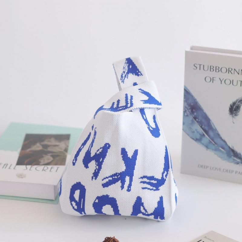 Ins Internet celebrity handbag women's knitted wool bucket bag Japanese and Korean version versatile hand carry casual tote bag box lunch bag