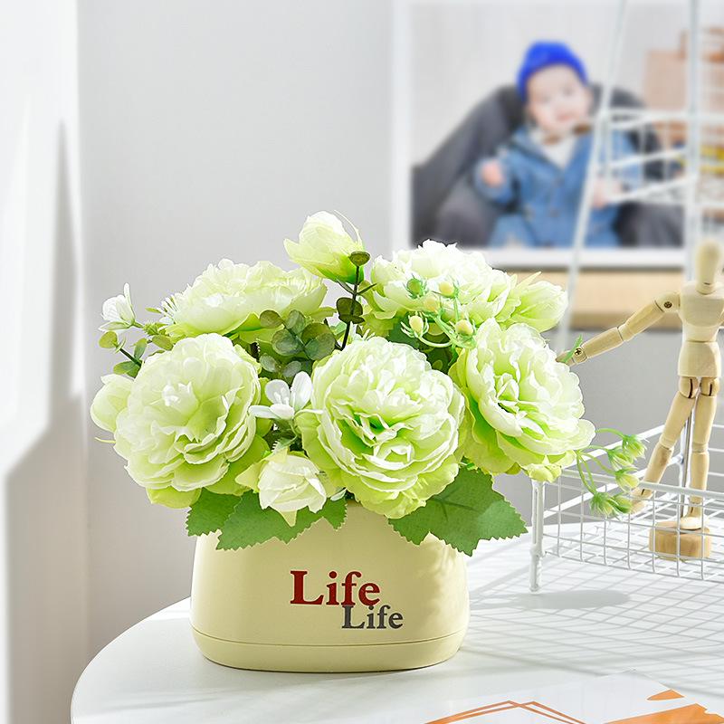 Living Room Decor: Artificial Sunflower and Green Plant Arrangements, Small Potted Plants, and Plastic Bouquets